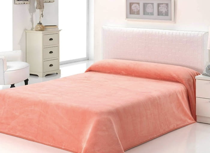 Manta terciopelo rosa salmón