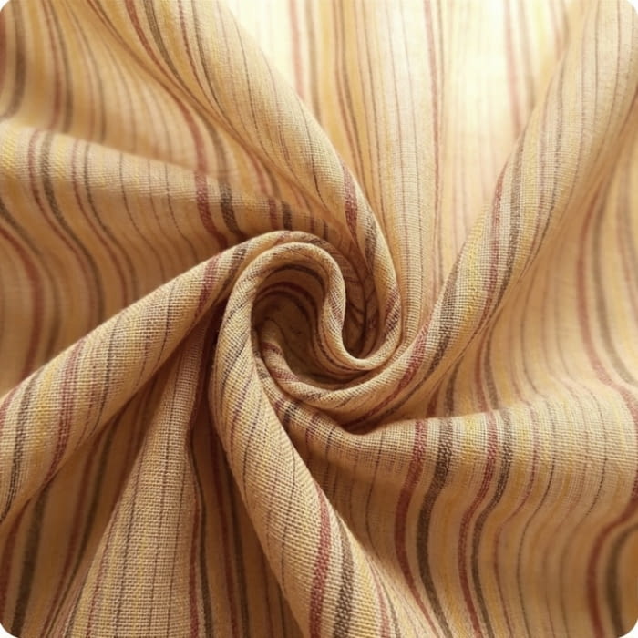 Tela por metros visillo ocre rayitas granates