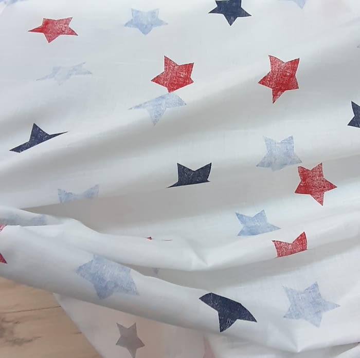 Tela visillo juvenil estrellas azules