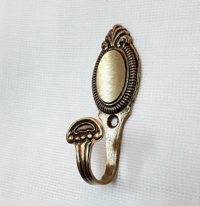 Alzapaño dorado 8 cm - 1