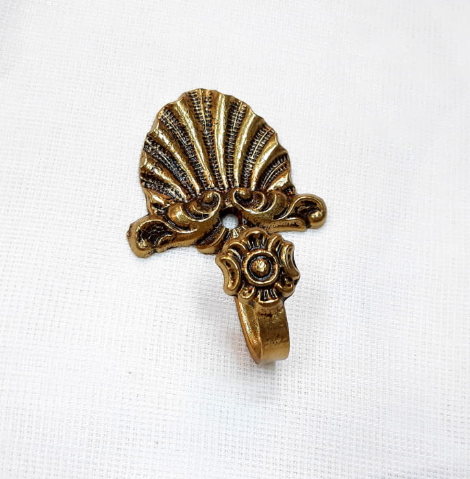 Alzapaño dorado concha 9 cm - 2