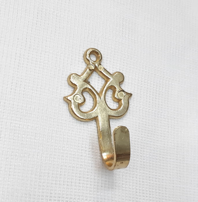 Alzapaño dorado celta