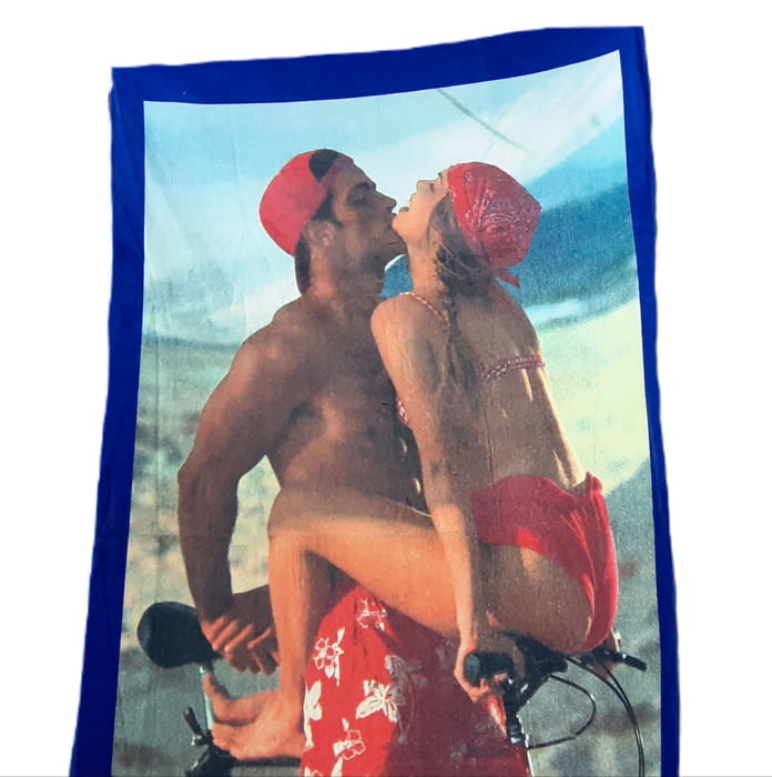 Toalla playa pareja en bici