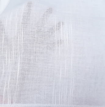 Retal de tela de visillo blanco con gatas