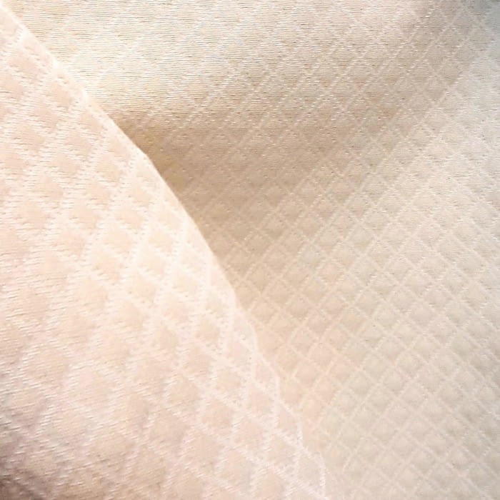 Tela Piqué rombos vainilla