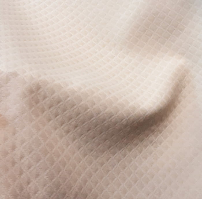 Tela Piqué rombos vainilla - 1