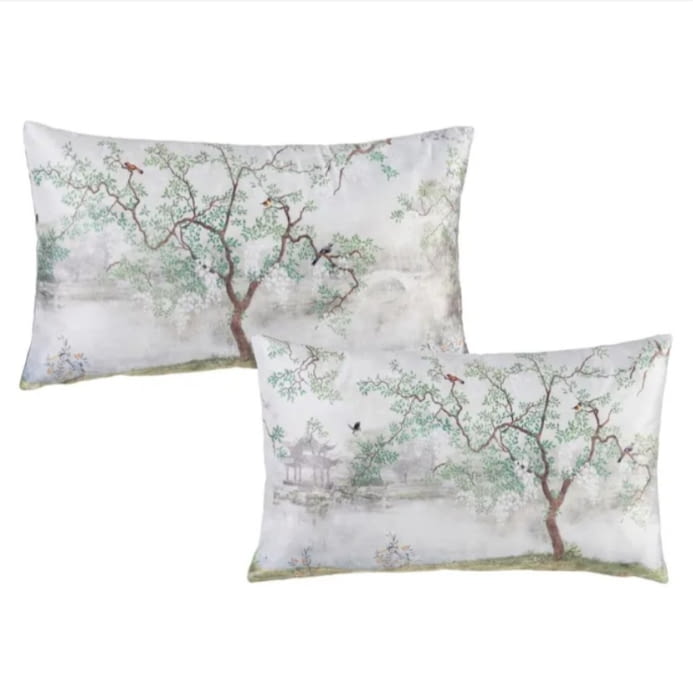 Cojín blanco árbol verde agua