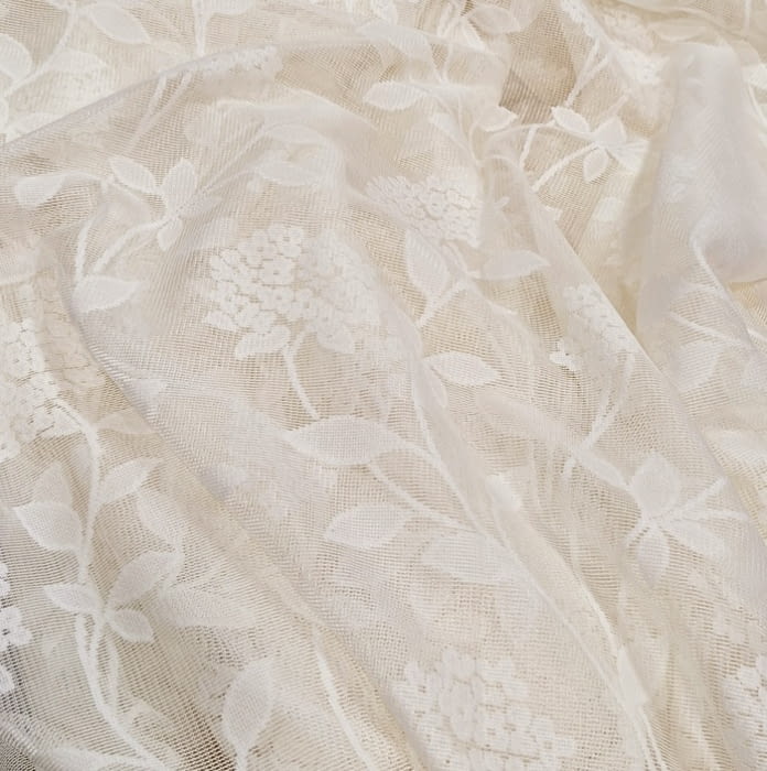 Tela por metros retal malla beige flores