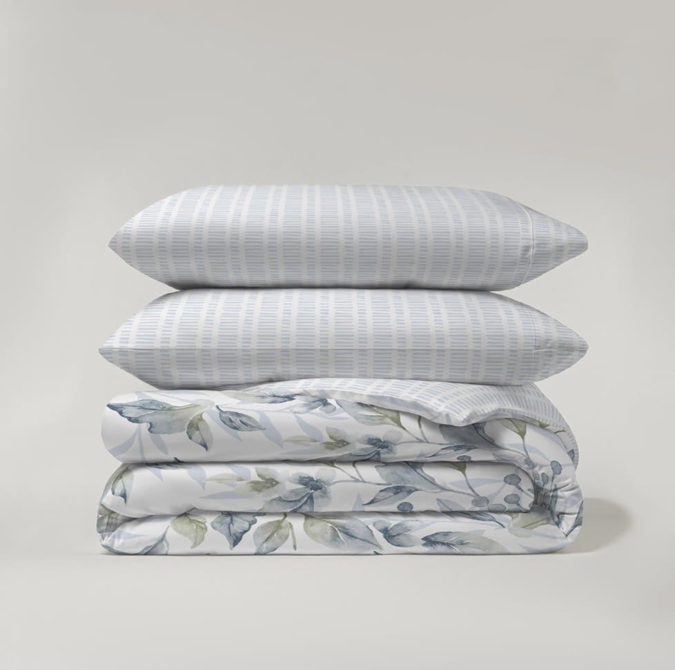 Juego funda nórdica reversible hojas y rayas azules