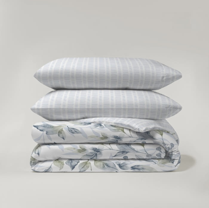 Juego funda nórdica reversible hojas y rayas azules