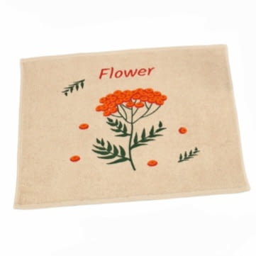 Paño de cocina beige flores naranjas