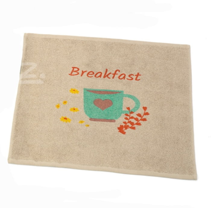 Paño de cocina beige con taza