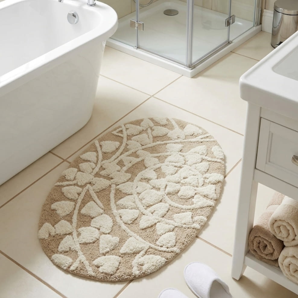 Alfombra de baño ovalada beige