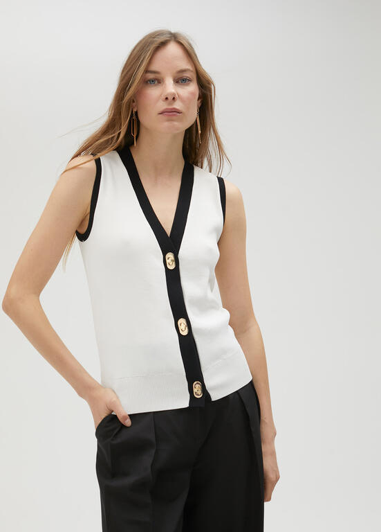 LOLA CASADEMUNT chaleco blanco y negro  con hebilla en oro