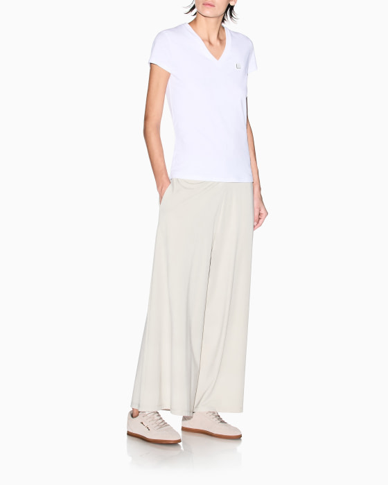 ARMANI EXCHANGE pantalón beige ancho con gomas