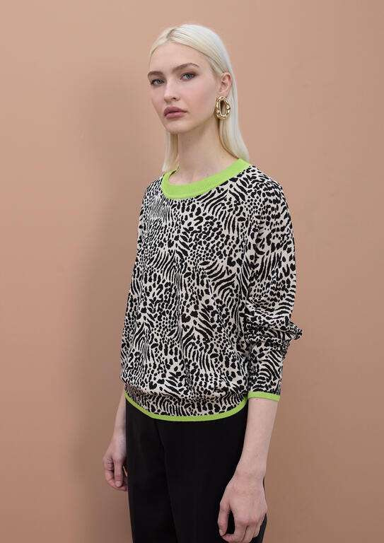 LOLA CASADEMUNT by MAITE jersey en animal print  con vivos en verde