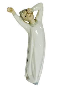 Figura porcelana Lladró. Niño bostezando.