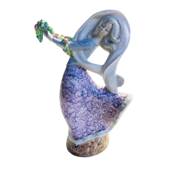 Figura de porcellana. Dona amb ram de flors.