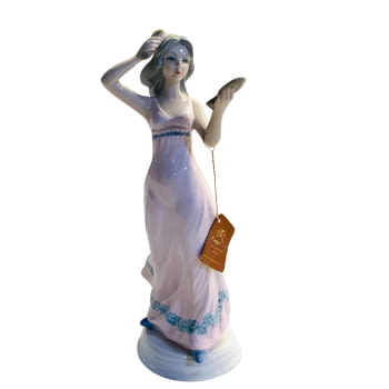 Figura porcellana. Dona pentinant-se.