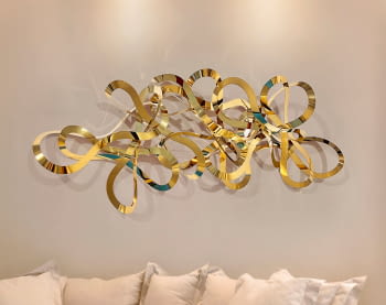 Escultura pared Medusa Acero Dorado (155x55x25)