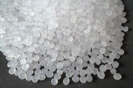 What are the properties of polyethylene (PE)?