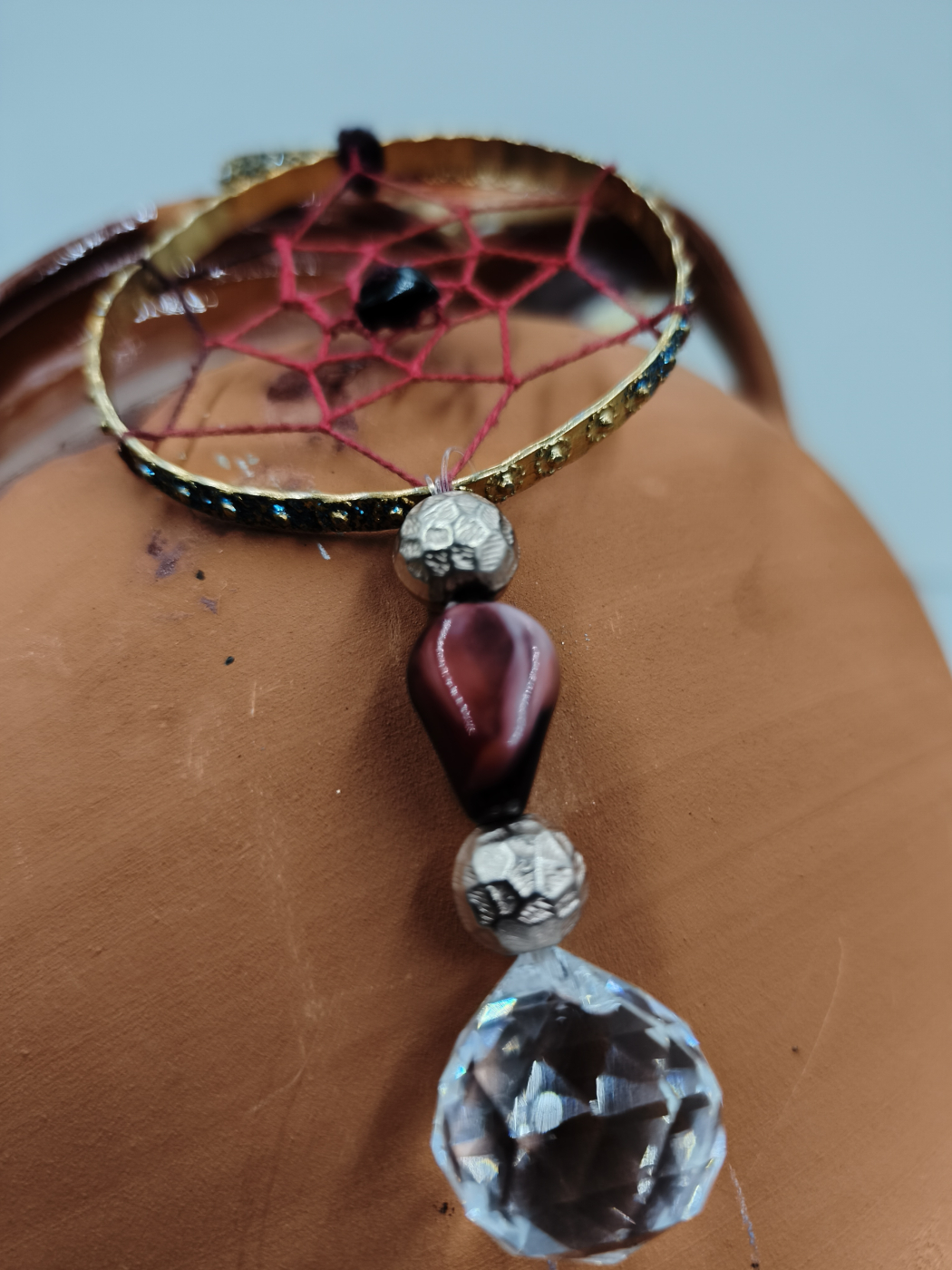 Atrapasols daurat i blau