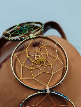 Atrapasols daurat i blau - 7