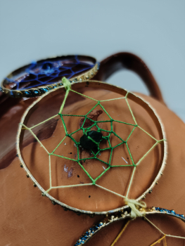 Atrapasols daurat i blau - 9