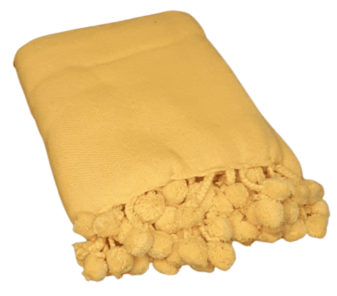 Colcha multiusos amarilla con madroños. Cama 90