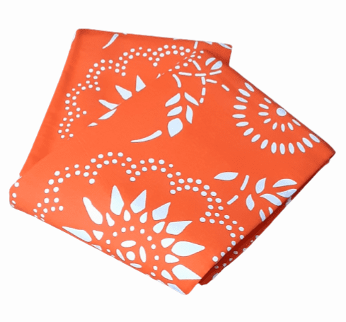Colchas multiusos naranjas con dibujos blancos. - 3
