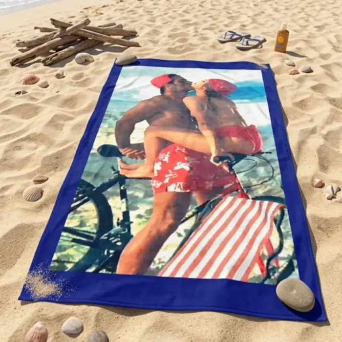 Toalla playa pareja en bici