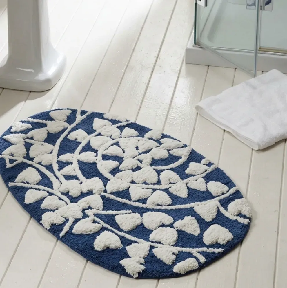 Alfombra de baño ovalada azul