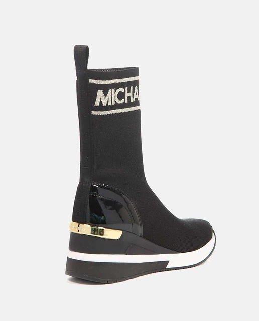 MICHAEL KORS bota en calcetín color negro con logo y suela en goma blanca - 2